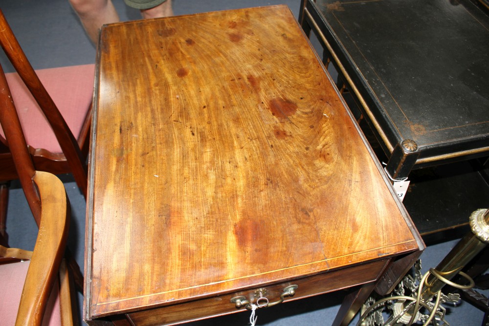 A George III strung mahogany butterfly wing mahogany table, with frieze drawers and squared tapered legs, W.76cm D.52cm H.70cm